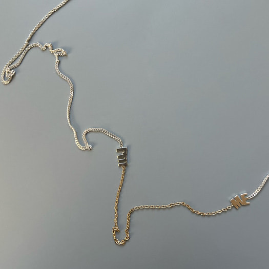 アイムミーと書いてあるnecklace